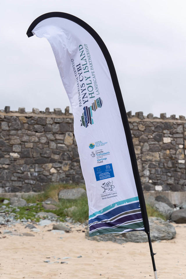 Baner hyrwyddo Partneriaeth Tirwedd Ynys Cybi