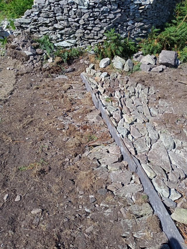 Y toriad dŵr wedi'i gwblhau