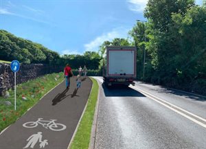 An image of people walking on a pavement next to a road with a lorry on it.